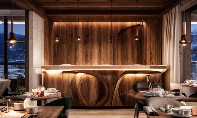 Boiserie in legno e bancone bar del ristorante Tre Cime a Cortina